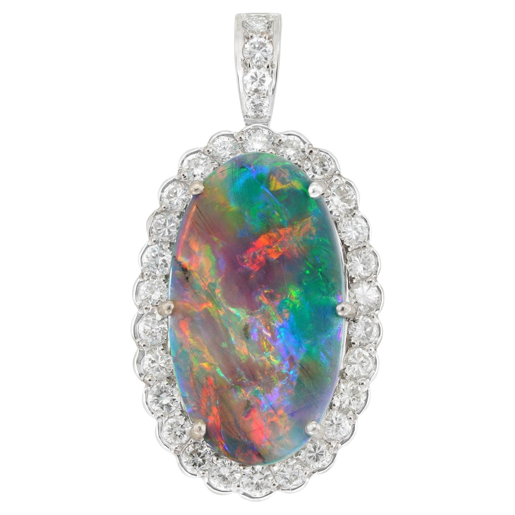 A Vintage opal and diamond pendant/ring