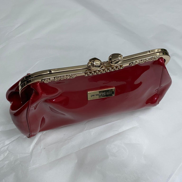 A 1980s Vintage Pierre Cardin Pink Plastic and Brass Handbag For Sale