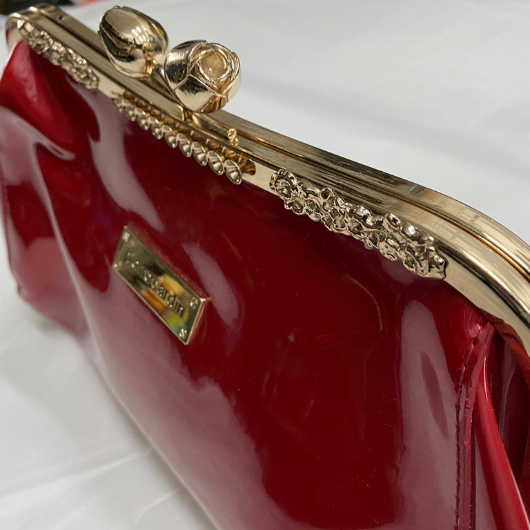 A 1980s Vintage Pierre Cardin Pink Plastic and Brass Handbag For Sale