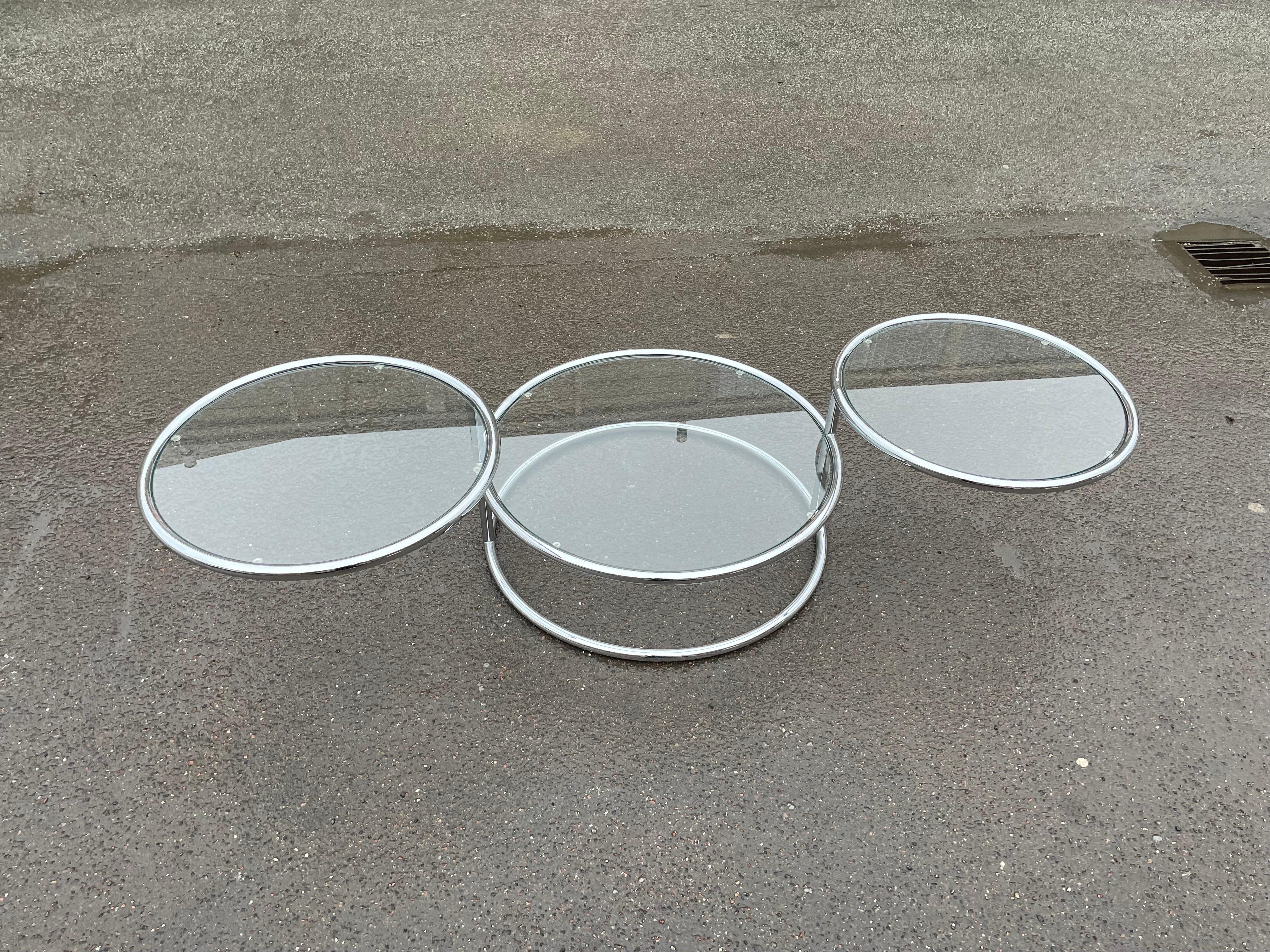 An Italian Mid-Century Modern Space Age-style 1970's, Convertible' circular cocktail / coffee table with a chrome tube frame. (MOREX). In perfect condition 41 cm height, diameter bottom table 76 cm, and the two swirvel tables are 60 cm in