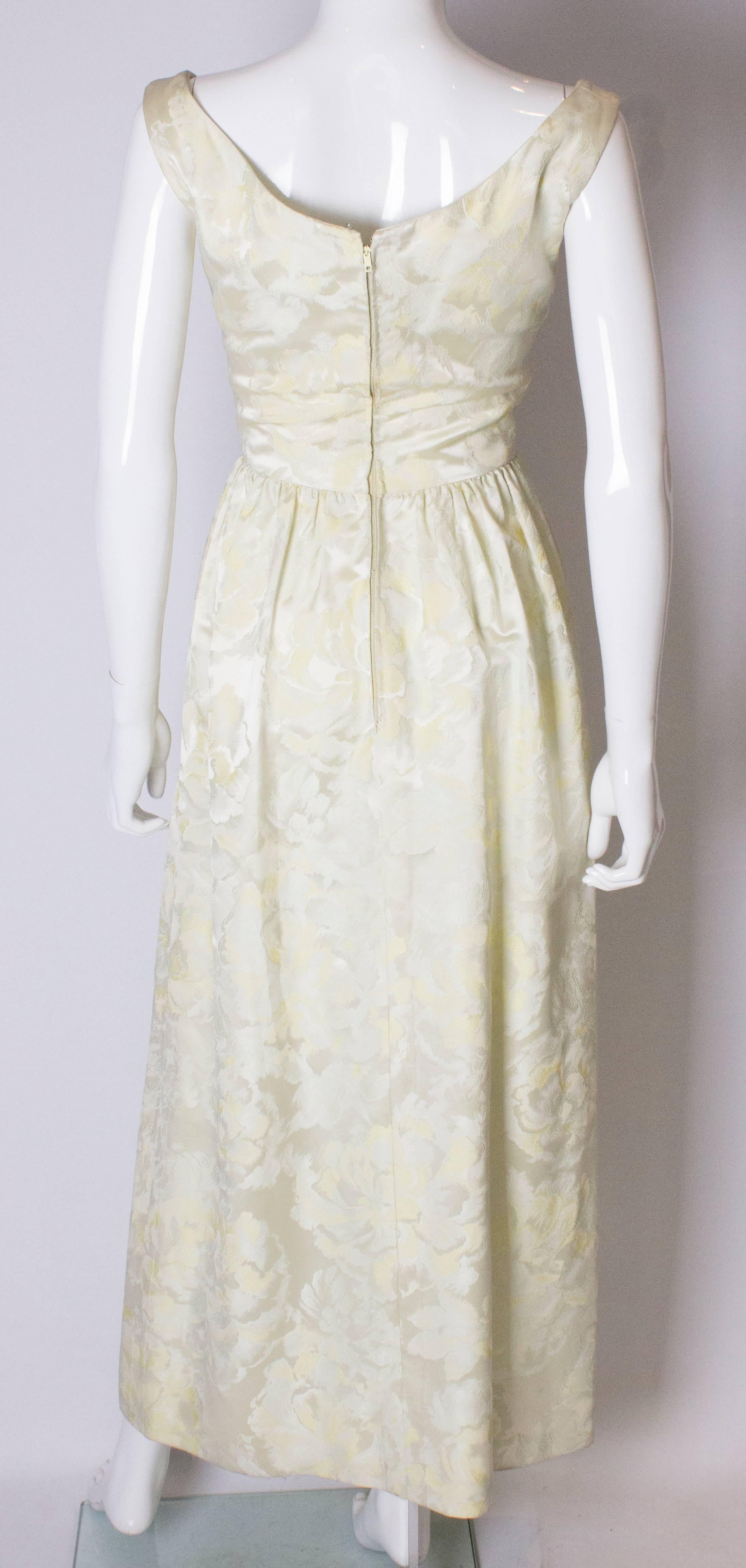 Women's A vintage Sarmi 1960s Pale Yellow Brocade Gown