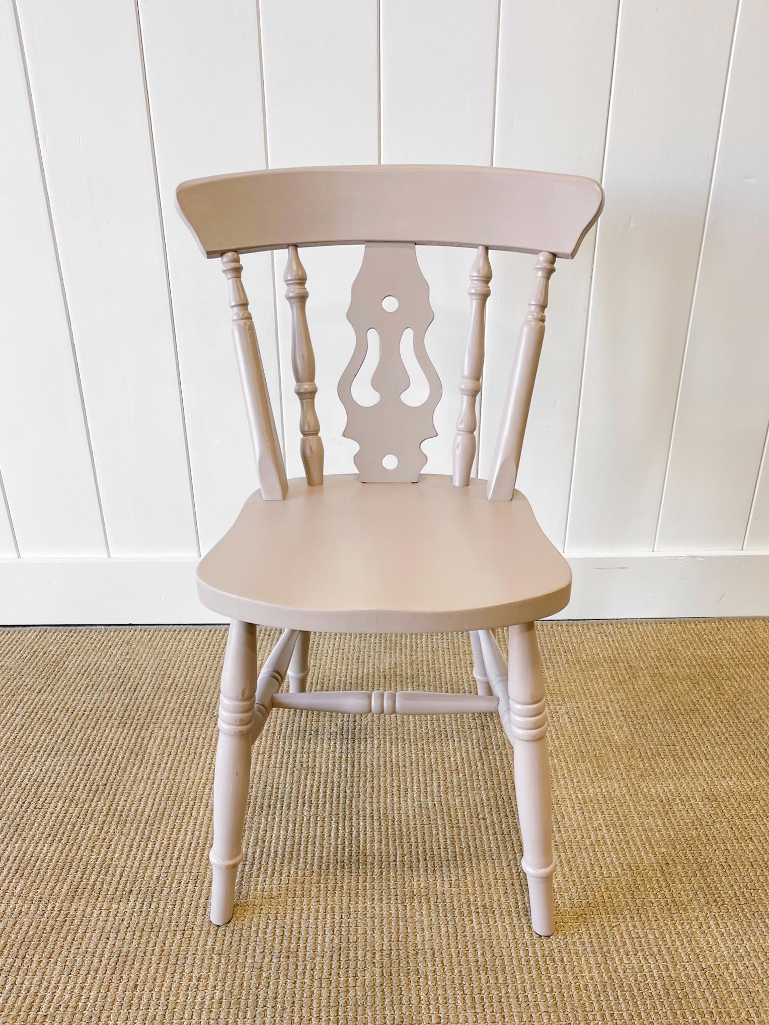 A good set of vintage fiddleback side chairs painted a nice taupe. Very solidly built in the traditional way.  Handsome profiles and good and heavy.  Perfect around a farmhouse table! Solid in joint. These are not antiques.

Condition: scratches,
