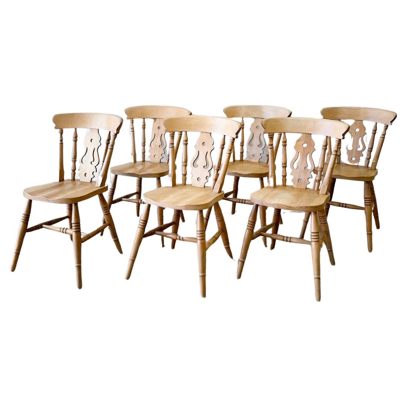 A Vintage Set of 6 Fiddleback Chairs