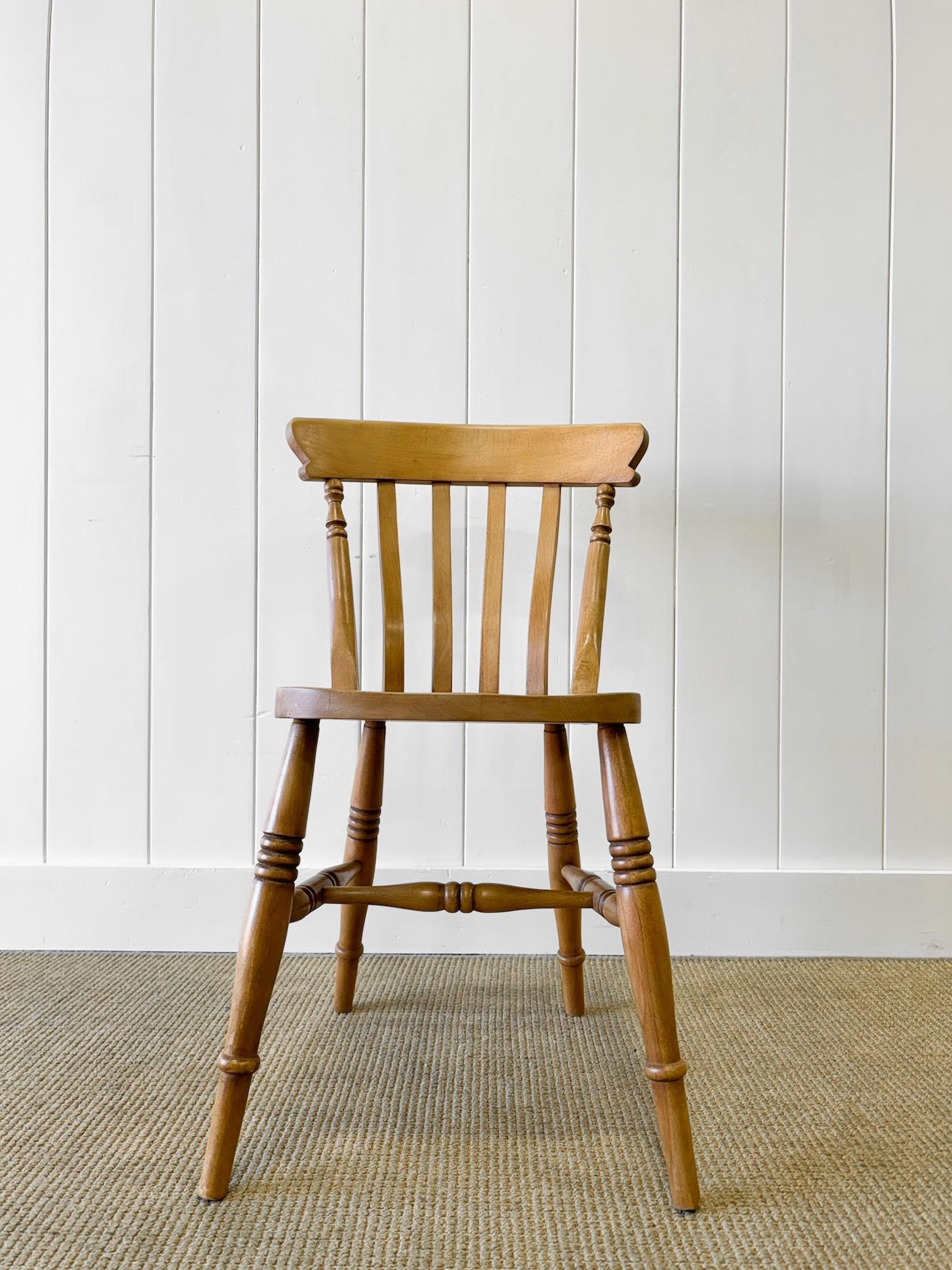 A good set of vintage ash slat back side chairs. Very solidly built in the traditional way.  Handsome profiles and good and heavy.  Perfect around a farmhouse table! Solid in joint. These are not antiques - excellent quality!

Condition: scratches,
