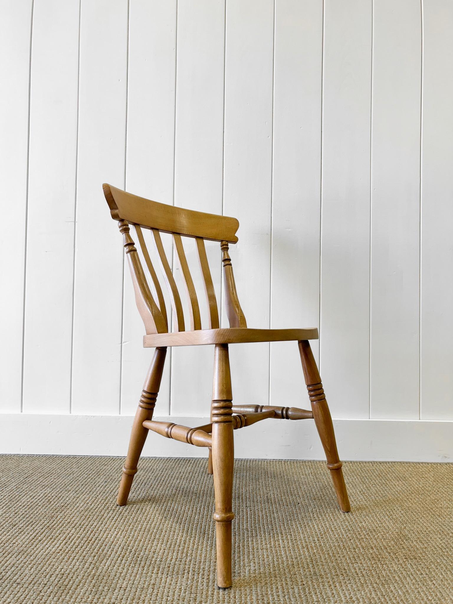 British A Vintage Set of 8 Slat Back Ash Chairs For Sale