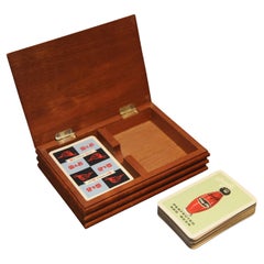 A Used Set of Teak Boxed Playing Cards with Poker Written On The Lid in Brass