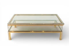 A Vintage Sliding Glass Top Coffee Table Attributed to Maison Jansen, c. 1970