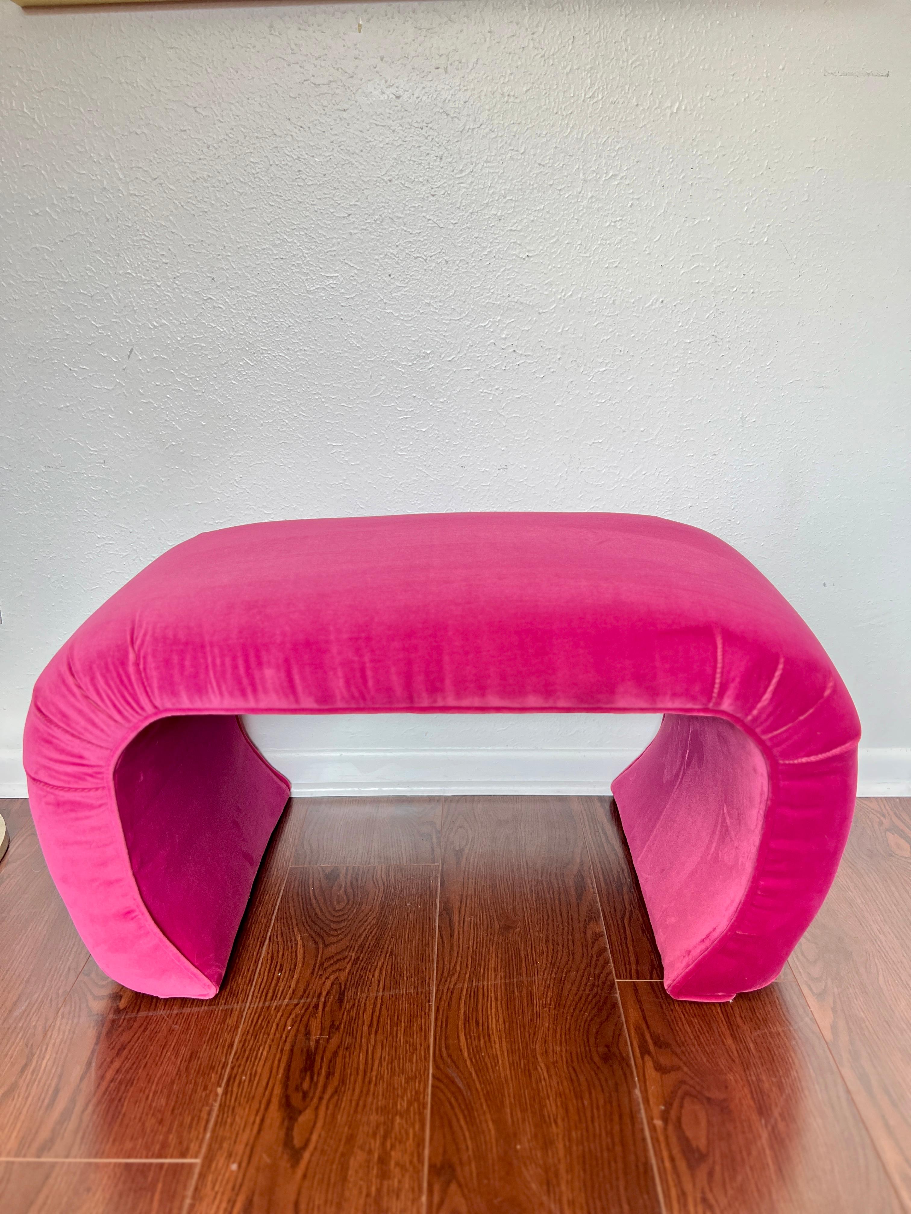 Unknown A vintage waterfall ottoman reupholstered in a hot pink performance velvet