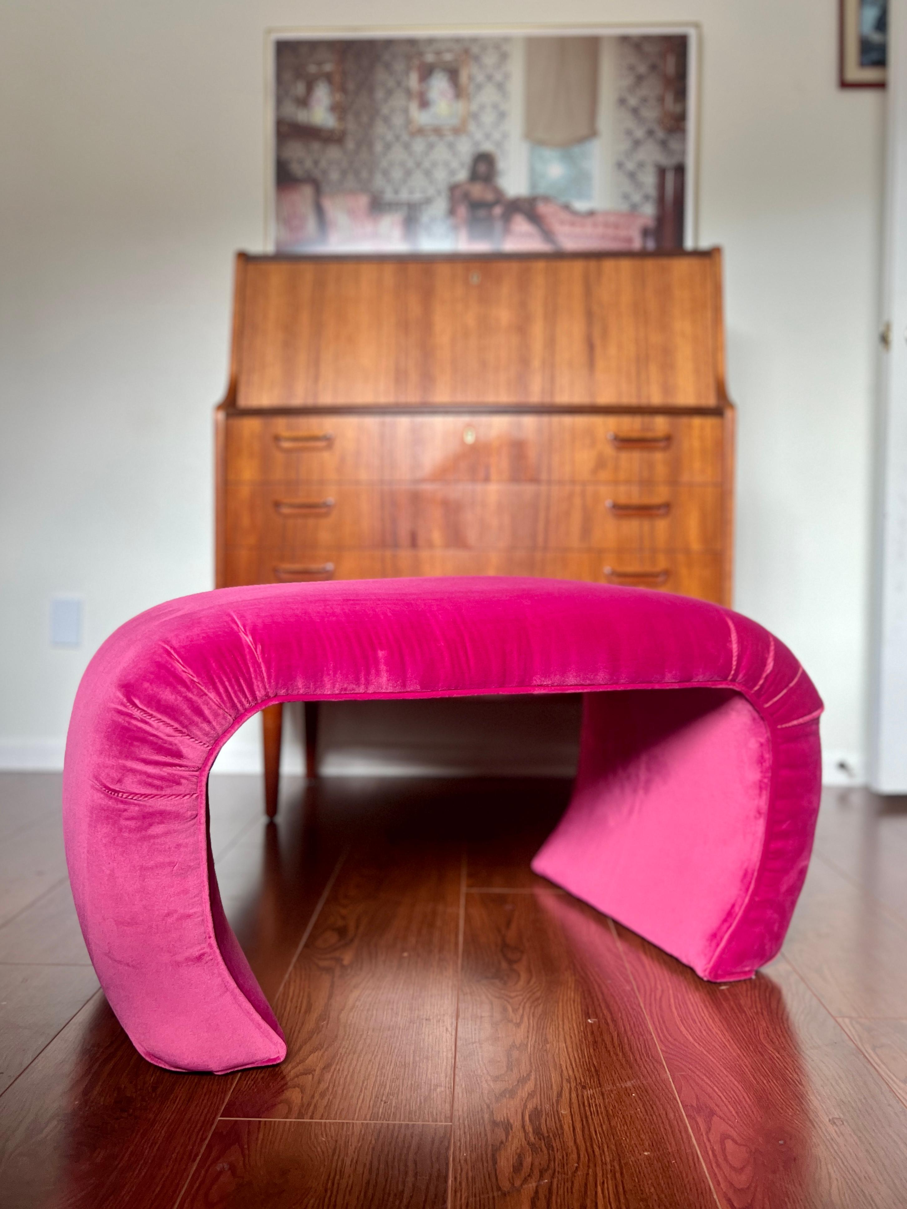 A vintage waterfall ottoman reupholstered in a hot pink performance velvet 1
