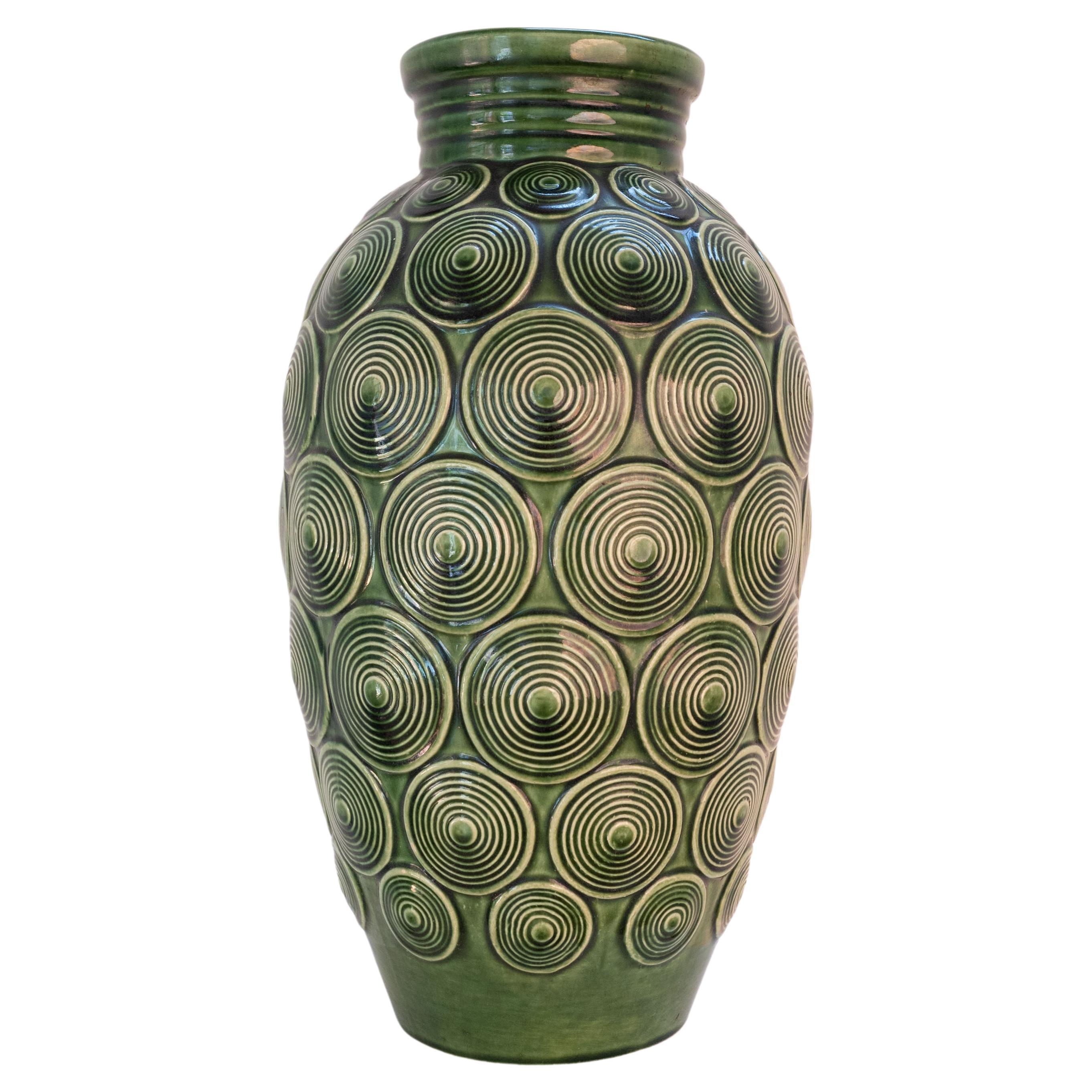 A vintage West Germany green glazed pottery vase