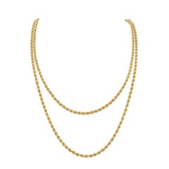 A vintage yellow gold rope chain necklace