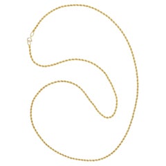 A vintage yellow gold rope chain necklace