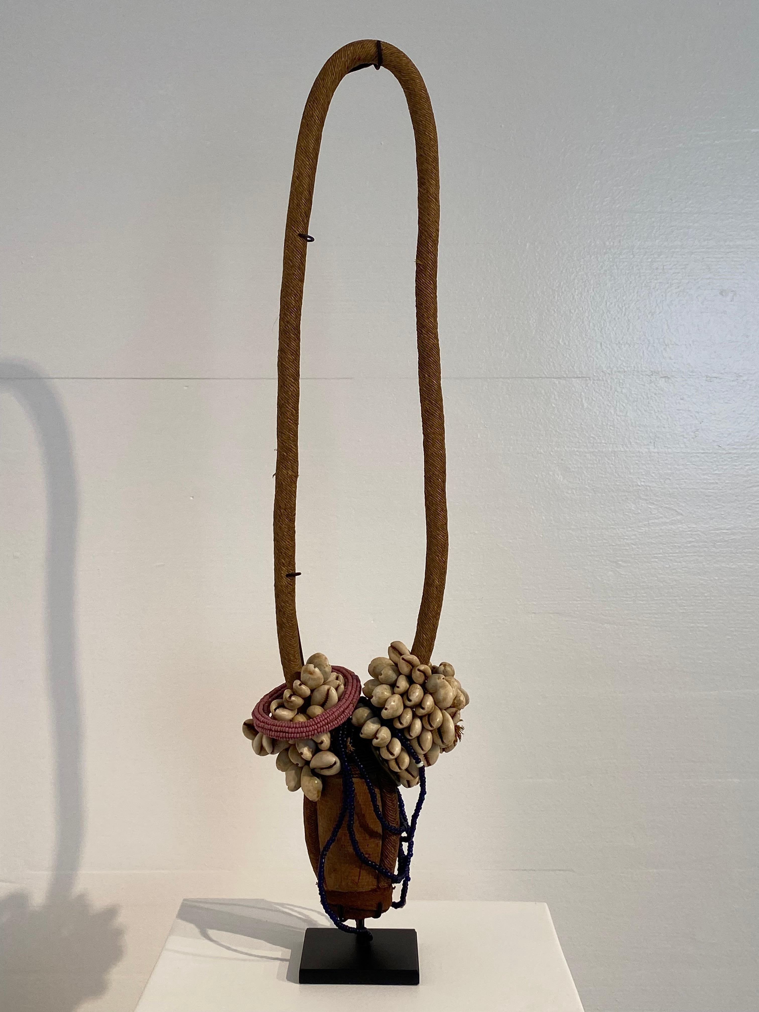 An exceptional Voodoo Objet fro Africa, Uganda ,Buganda Kingdom, 
the object is decorated with Shells, Beads, Fiber,seeds and iron,
a Royal fetish used by higher Royalty,
ex-collection Wolf-Dieter Miersch, Langenhangen, Germany