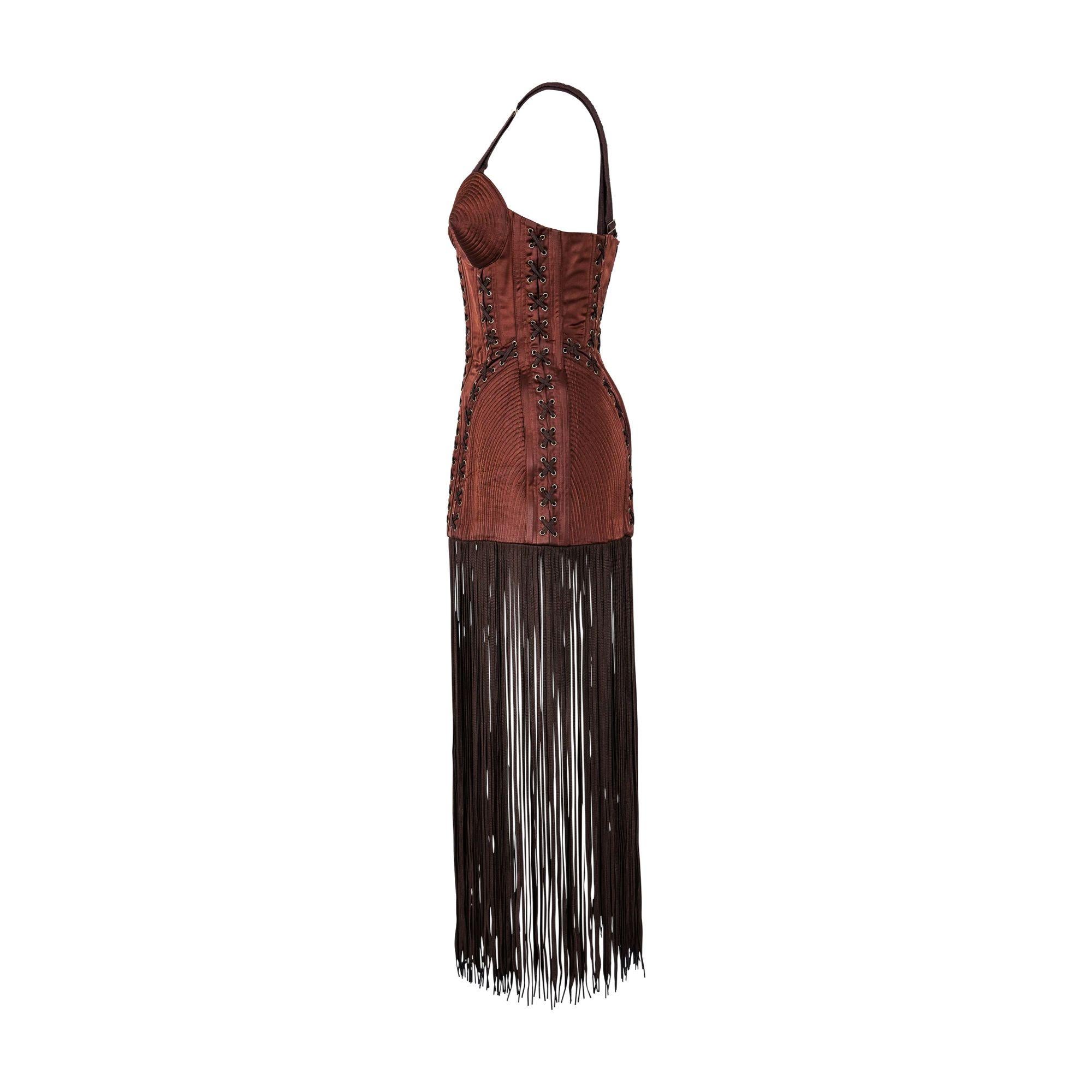 A/W 1990 Jean Paul Gaultier brown cone bra corset dress with shoestring fringe, created for Madonna's 'Blonde Ambition World Tour' and similar featured on the runway. A super rare piece. Fitted corset with adjustable length straps, boning, and