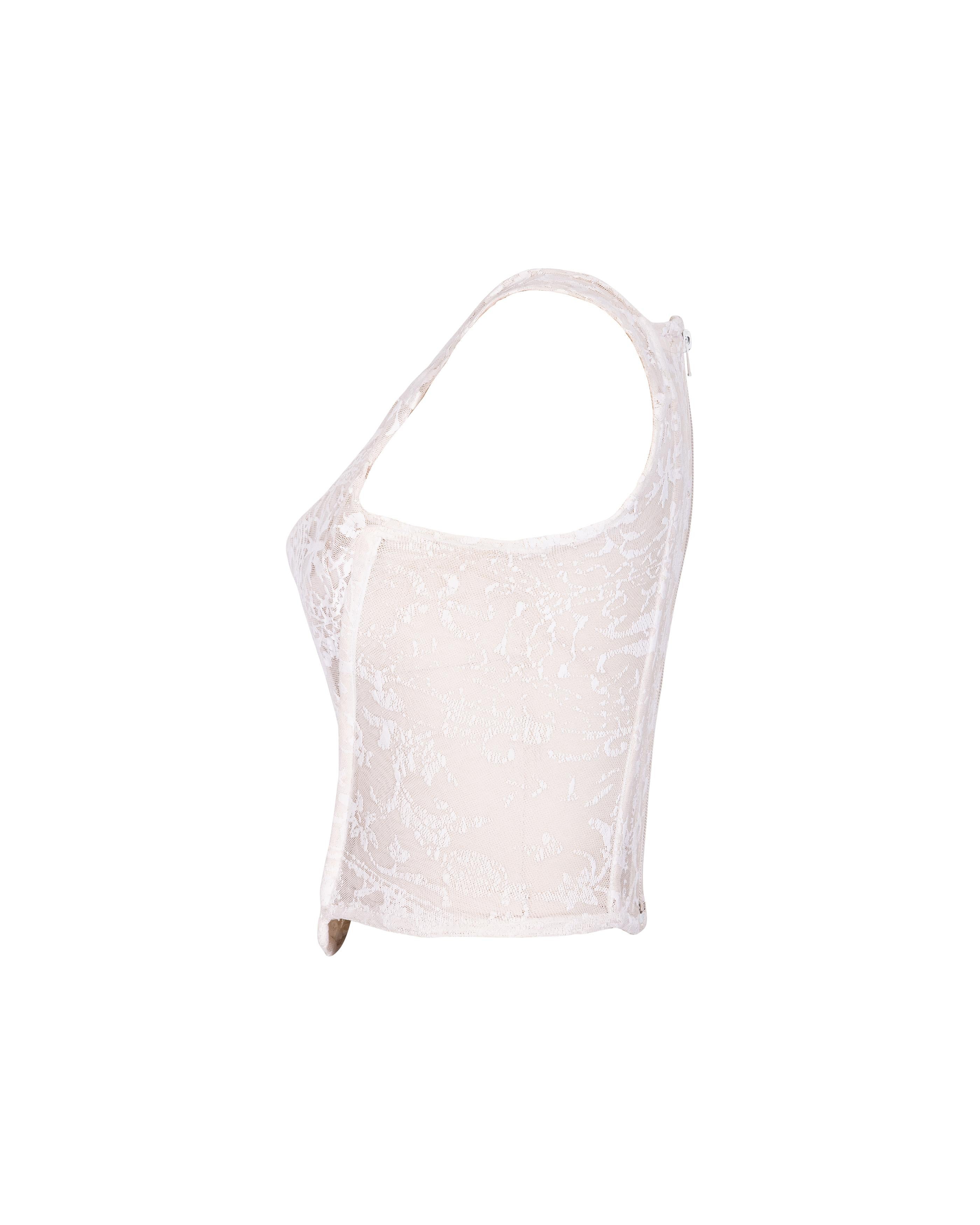 A/W 1992 Vivienne Westwood ecru lace corset. Boned corset with Hapsburg lace layered over nude mesh. Center back zip closure. Similar seen on Naomi Campbell on the runway. In very good vintage condition with light wear throughout; has been taken to