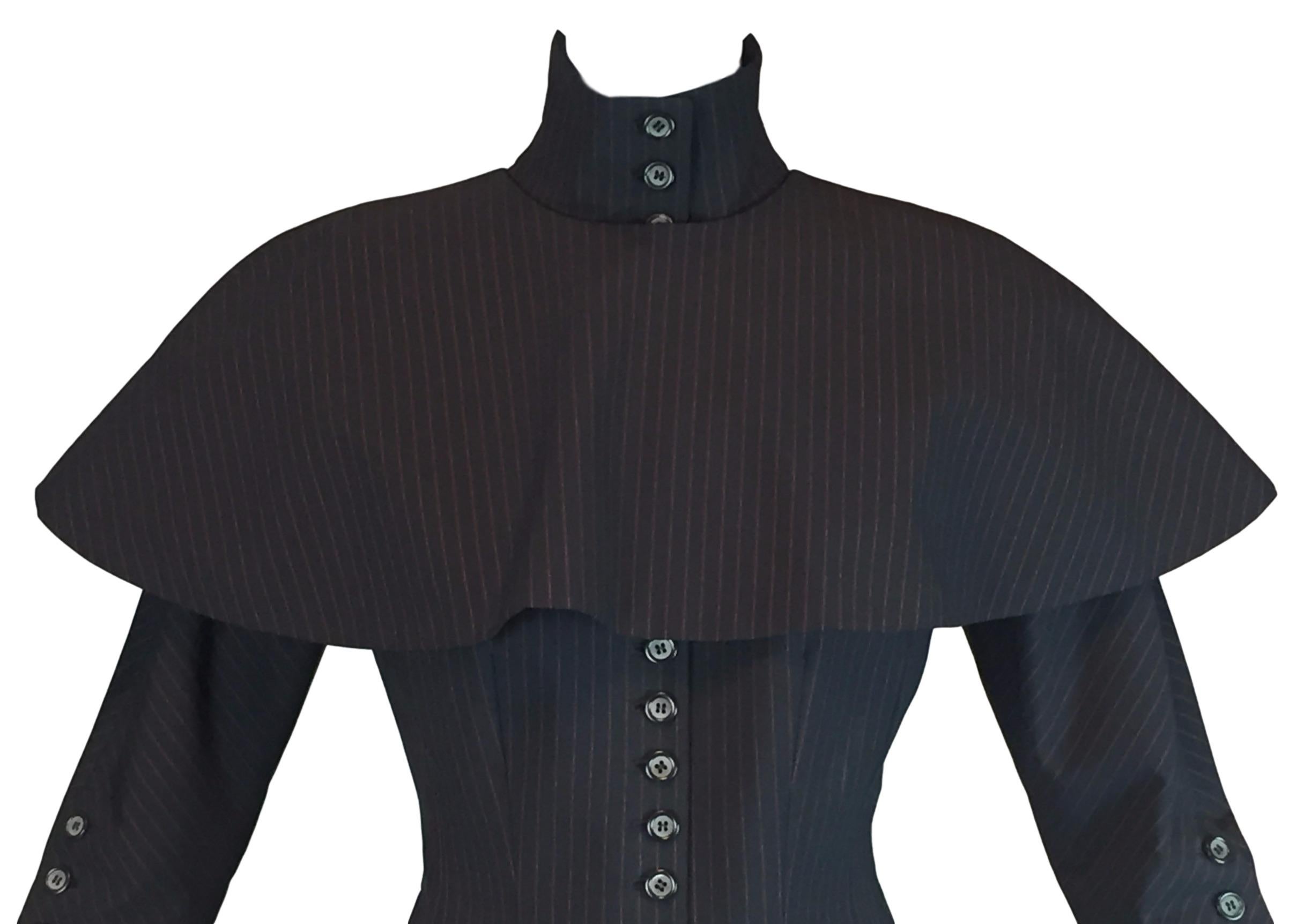 DESIGNER: A/W 1998 Alexander McQueen runway

Please contact for more information and/or photos.

CONDITION: Good- there are two incredibly minor marks in the lining of the cape however it is likely these imperfections were on the lining fabric prior