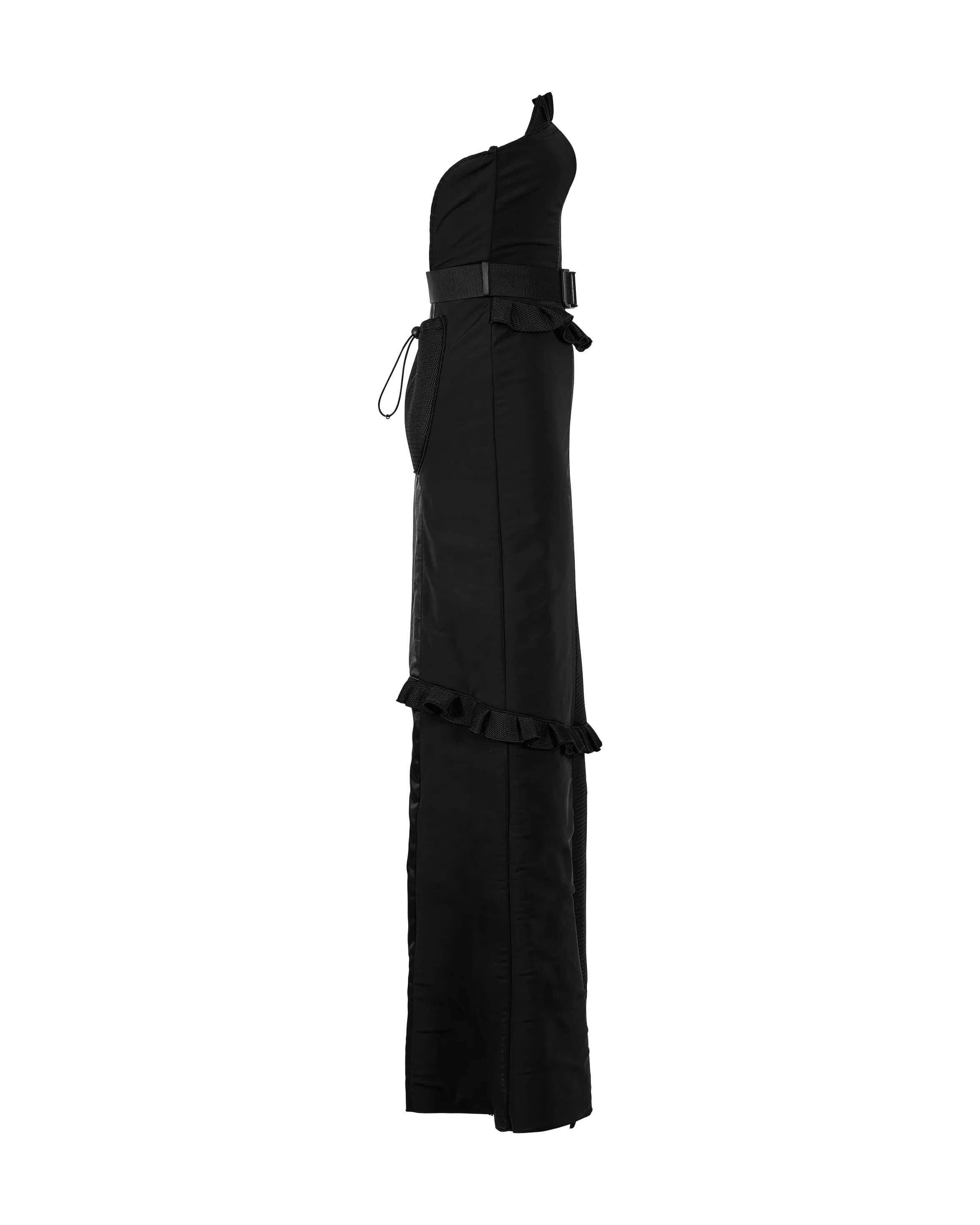 A/W 1999 Miu Miu by Miuccia Prada utility-inspired black strapless nylon and neoprene mesh dress with adjustable seatbelt buckle accent. Showstopping nylon dress with mesh paneling throughout, including intricate mesh ruffle bust and hip detailing,