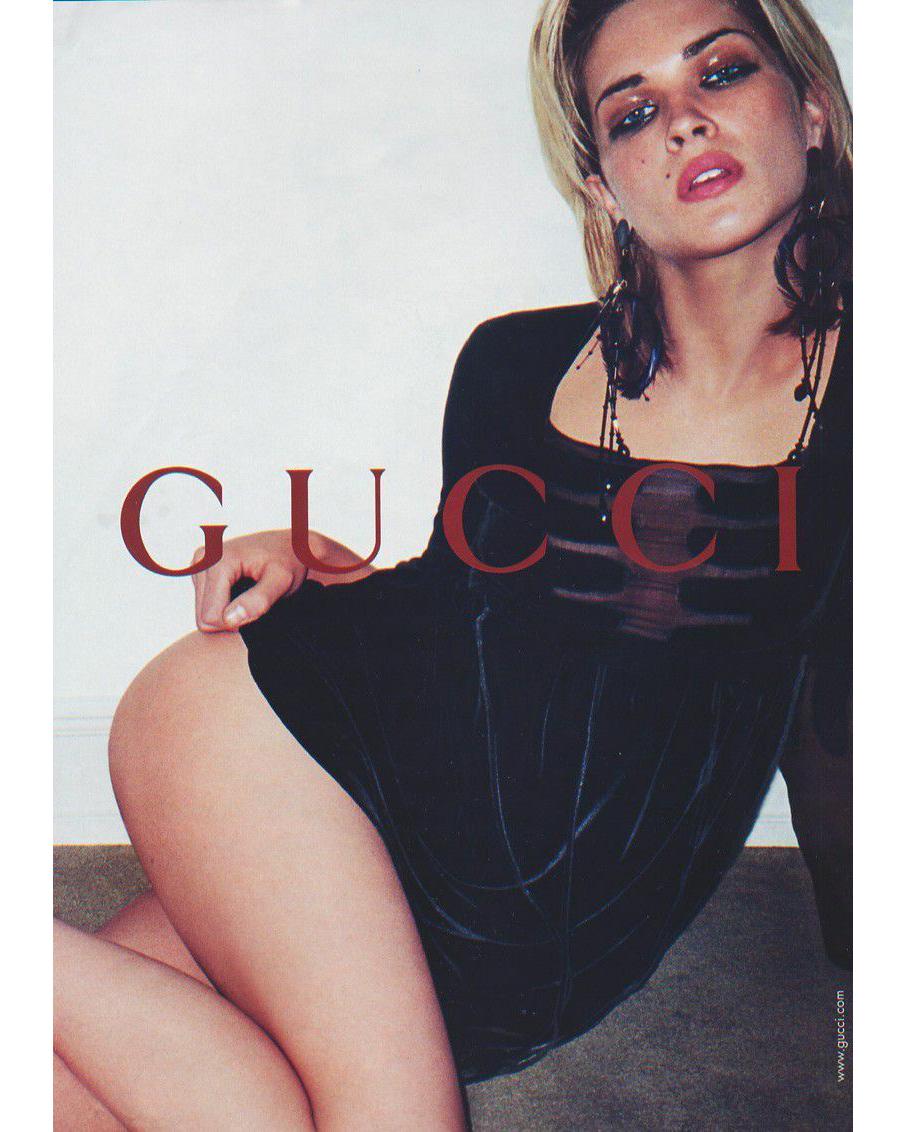 A/W 2001 Gucci by Tom Ford black velvet and silk chiffon babydoll mini dress. Features contrasting silk chiffon and velvet curved paneling at chest and sleeves. Long sleeve dress with square neckline and hidden side zip closure. Features velvet belt