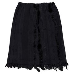 Pasarela A/W 2002 Gucci by Tom Ford falda de piel