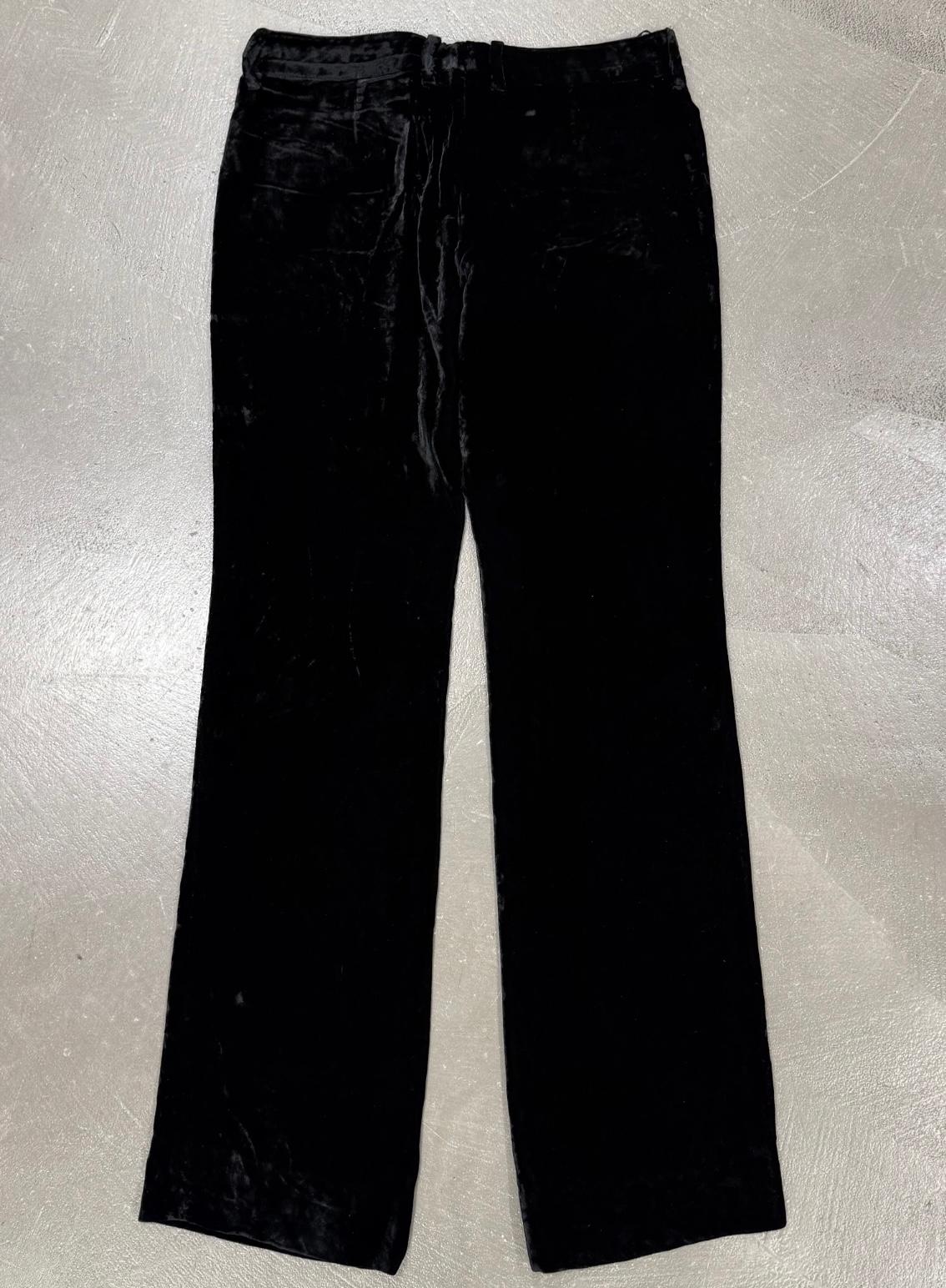 A/W 2004 Gucci by Tom Ford crushed velvet pants

Luxurious crushed-velvet trousers from Tom Ford’s A/W 2004 collection for Gucci. The deep texture, soft sheen, and elongated silhouette capture Ford’s signature mix of sensuality and precision