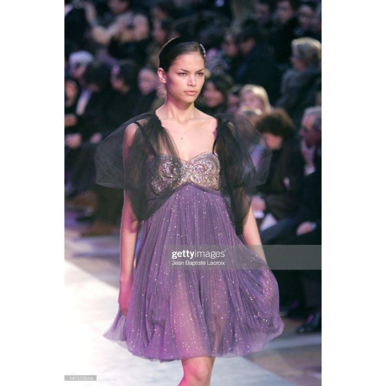 A/W 2005 Lanvin by Alber Elbaz crystal bodice pleated tulle mini dress. Cream colored bodice with abstract floral pattern rhinestones and beading. Purple metallic tulle skirt. Sweetheart neckline with deep blue velvet spaghetti straps. Concealed zip