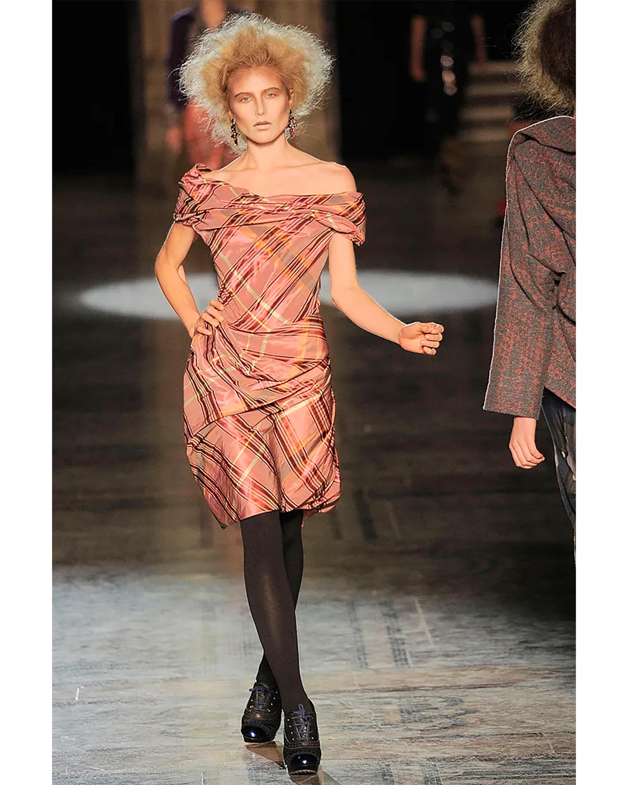 A/W 2010 Vivienne Westwood 'Red Label' blue plaid dress, featuring cream, orange, pink and blue stripe plaid pattern throughout. Fitted waist with signature deconstructed asymmetrical ruched paneling at bust and hips. Sleeveless cowl neck dress with