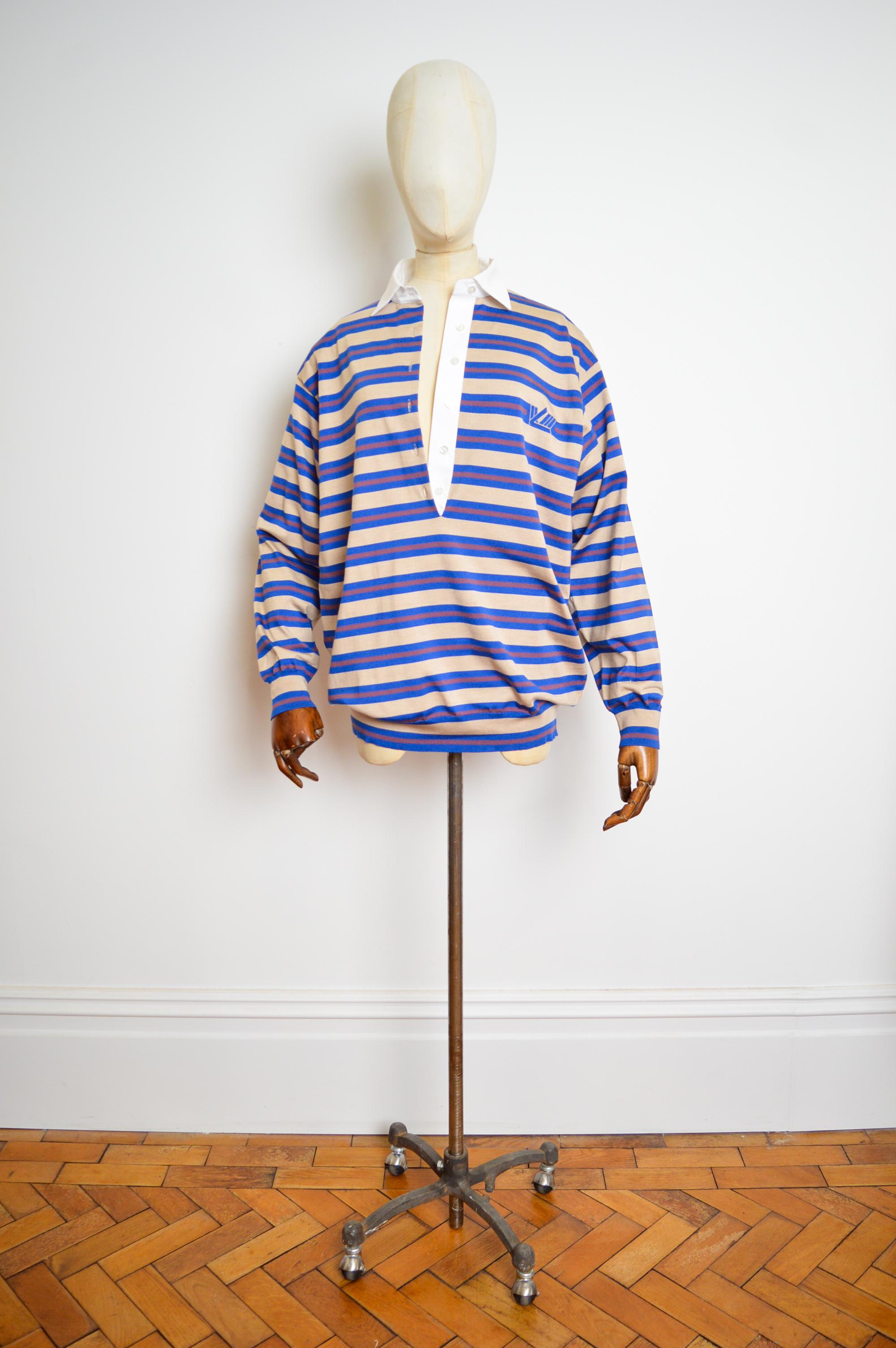 Original Runway Sample for Fall / Winter 2021-2022 'Rugby Sweater' by LOUIS VUITTON.

MADE IN PARIS. 
(Handwritten Labels from the LV Ateliers in Paris).

Features ; Merino Wool fine knit with contrast crisp white cotton collar detail, long sleeves,