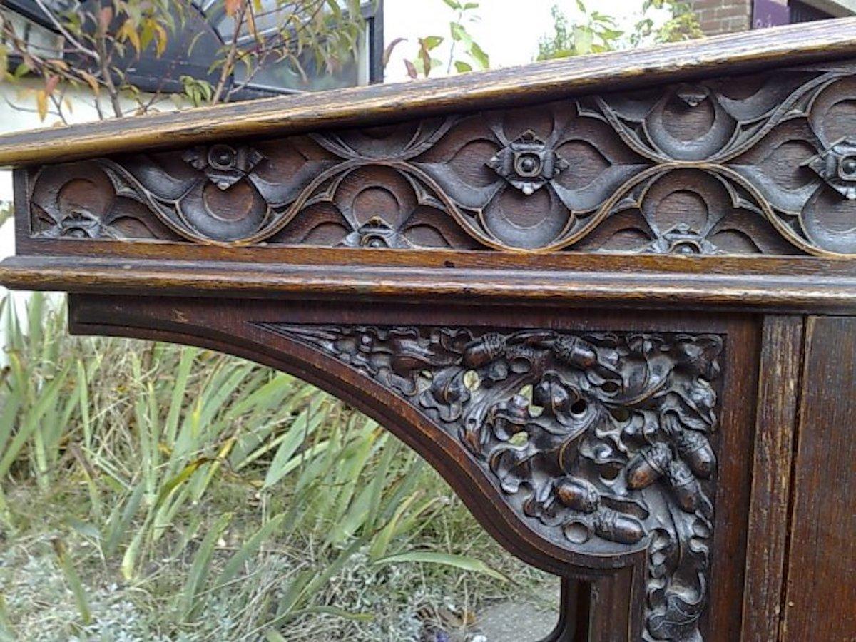 A W N Pugin Attri, Gothic Revival Oak Davenport with Linenfold & Floral Carving For Sale 4