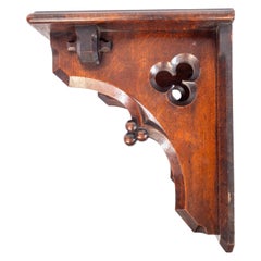A. W. N. Pugin, in the style of. Gothic Revival oak bracket or wall shelf