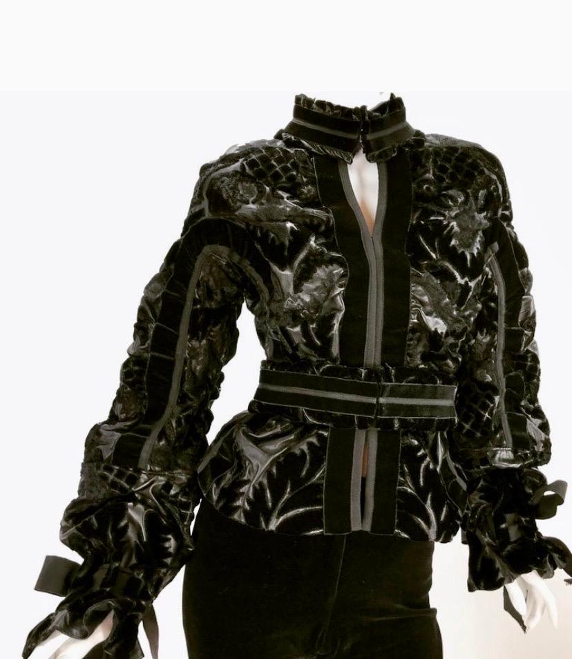A/W 2002 Look #28 
Tom Ford for Yves Saint Laurent Black Velvet & Leather Jacket
Size: FR - 38, US - 6
Fabric: 100% Leather;
Lining: 100% Silk;
Velvet: 100%
Viscose;
Tulle : 100% Nylon
New, with tags attached.
Pristine condition.