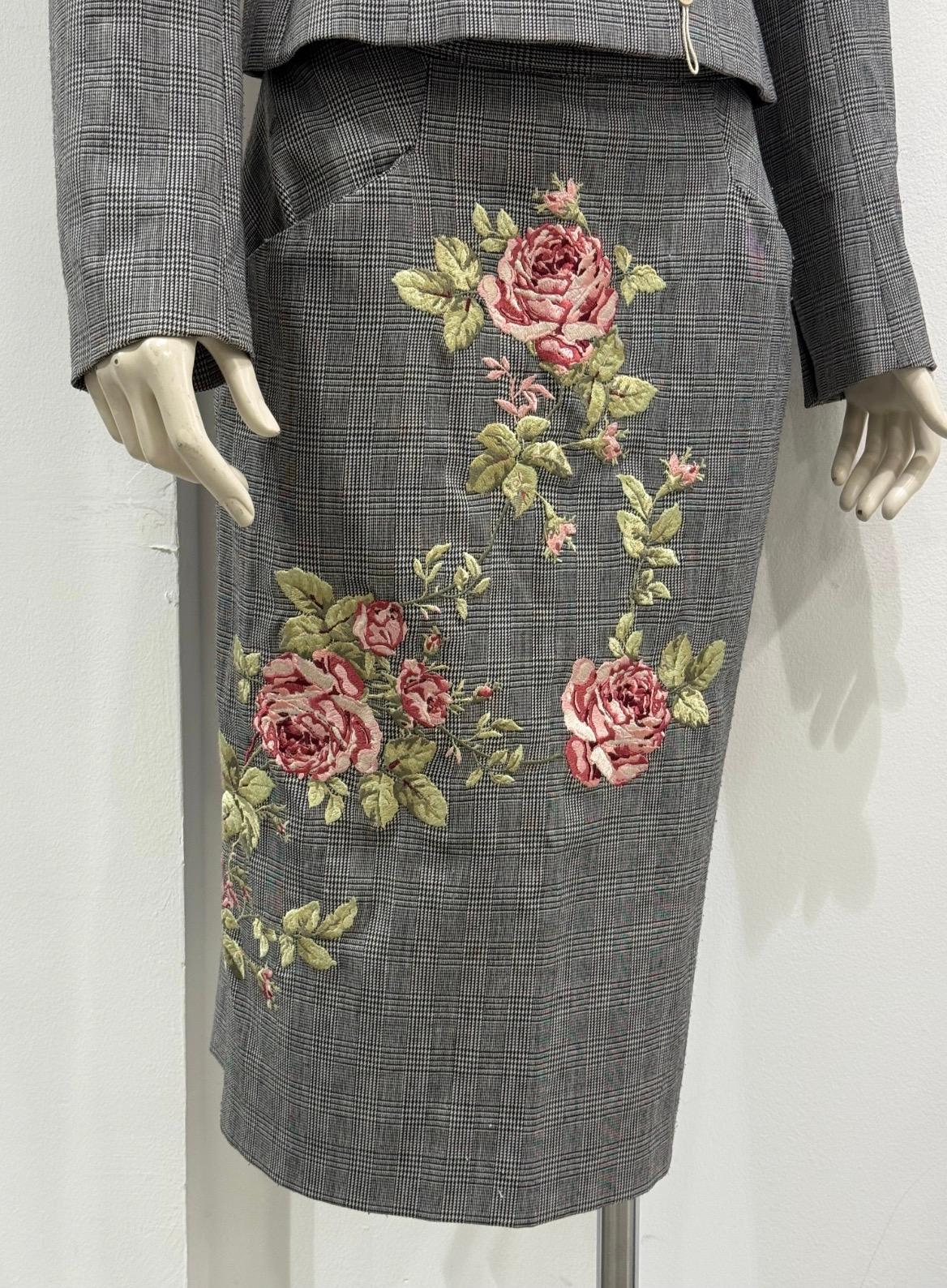 A/W1997 Alexander McQueen runway checked embroidered suit set

Exceptional runway suit set from Alexander McQueen's Autumn/Winter 1997 collection. Composed of a fitted grey checked wool blazer with strong shoulders and a matching pencil skirt, both