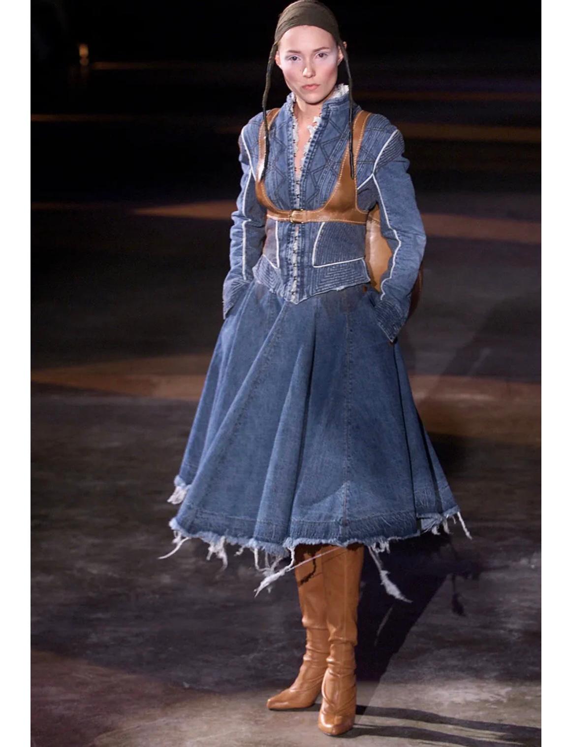 A/W 2002 Alexander McQueen runway corseted denim jacket

This Alexander McQueen jacket from the Autumn/Winter 2002 collection is a striking example of the designer's architectural approach to tailoring. Crafted from structured denim, it features