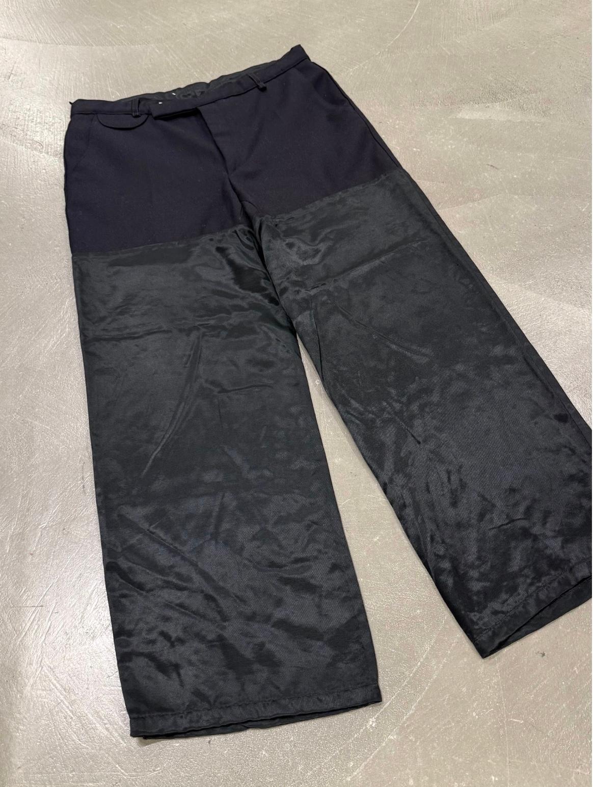 Black A/W2002 Maison Martin Margiela artisanal hybrid reconstructed pants in vendita