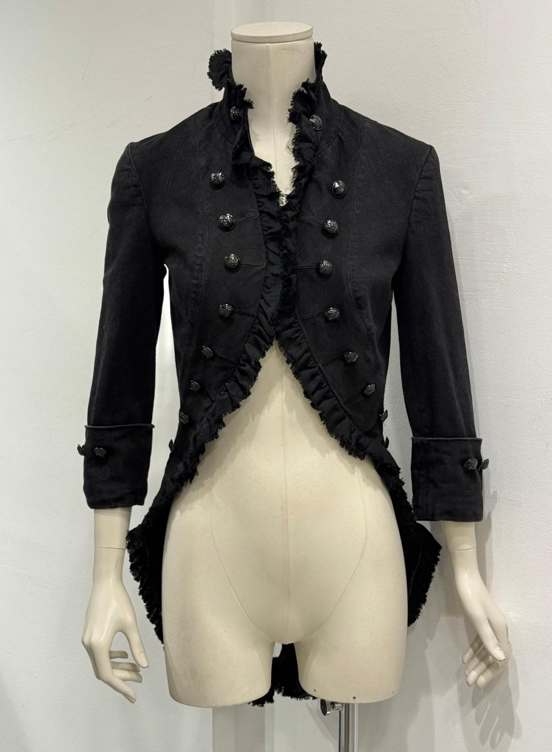 Rare archival military-inspired jacket by Alexander McQueen, dating to the Autumn/Winter 2008 collection. Characterized by a sharply tailored cropped front and elongated, swallowtail-style back, the piece draws from historical pirate and military