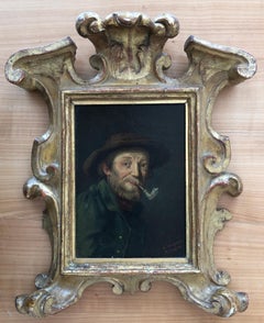 Bearded man with pipe and hat