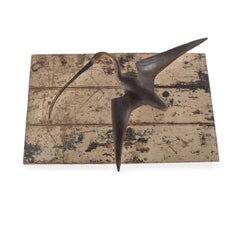 A Wall-mounted Sculpture of a Curlew, Carved and Painted, Mounted on a Painted P