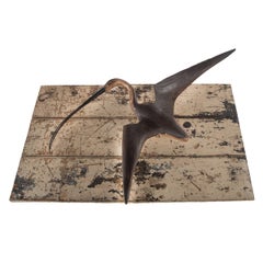 A Wall-mounted Sculpture of a Curlew, Carved and Painted, Mounted on a Painted P