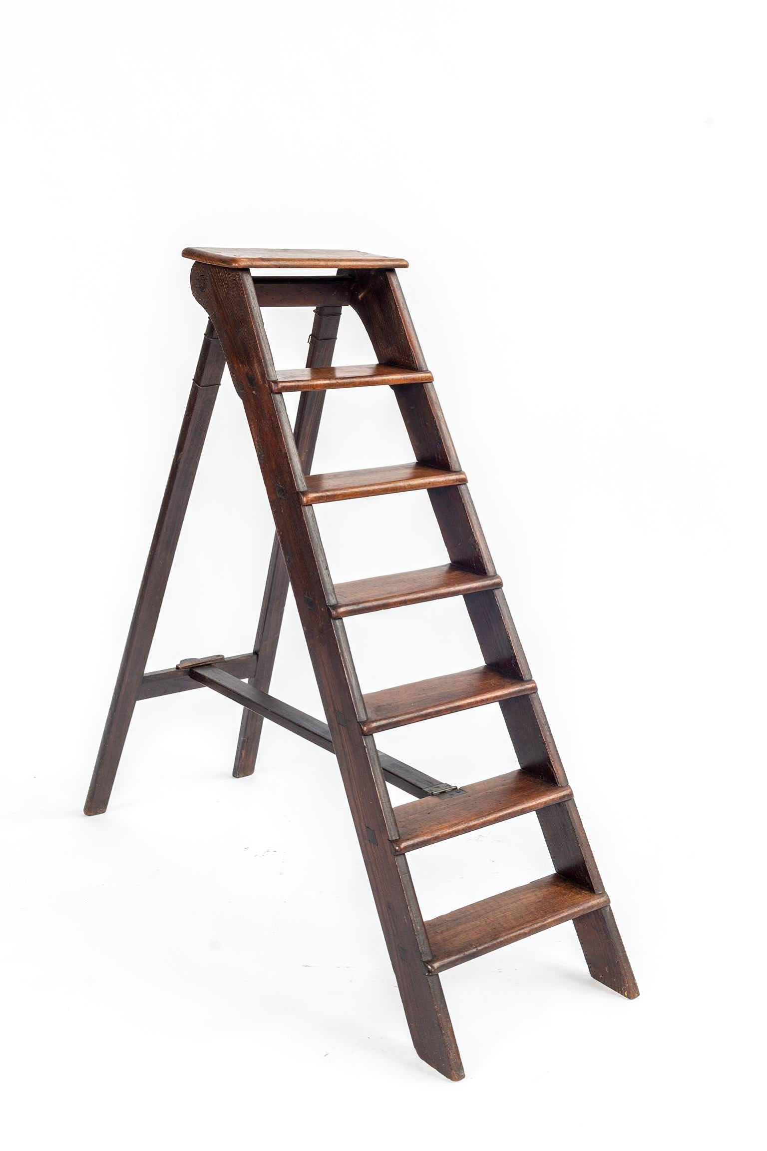 A walnut and chestnut library step ladder. Dimensions below are for the step ladder in open position.
The closed height is 53