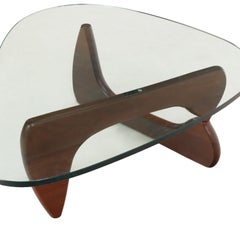 A Walnut and Glass Top Coffee Table by Noguchi for Herman Miller