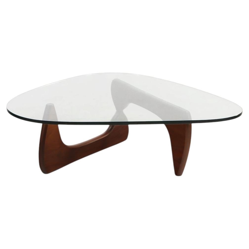 A Walnut and Glass Top Coffee Table by Noguchi for Herman Miller For Sale