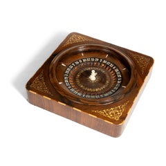 A Walnut And Marquetry Inlaid Roulette Wheel, American, Circa 1900