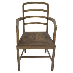 Heals attr, Ein Schreibtischstuhl oder Sessel aus Nussbaumholz mit abgerundeter Platte und Leiterrückenlehne.