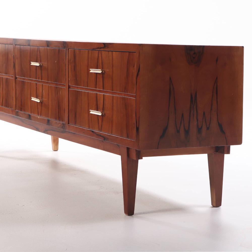A walnut six drawer dresser circa 1960 with exotic wood grain resembling a tigers skin.