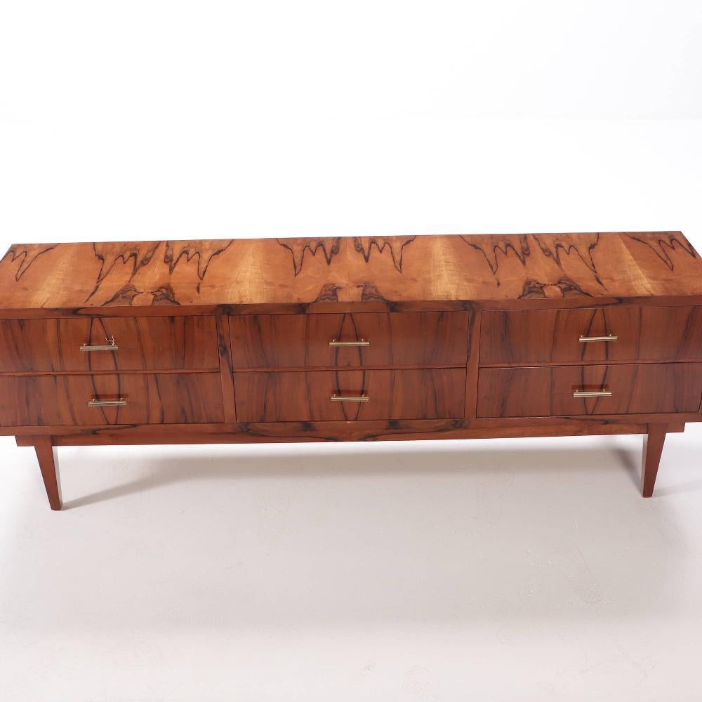A walnut six drawer dresser circa 1960 with exotic wood grain resembling a tiger In Good Condition For Sale In Philadelphia, PA
