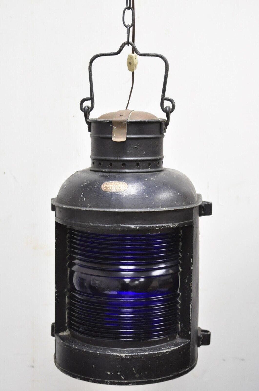 A Ward Hendrickson Marine masthead ship lantern cobalt blue lens hanging fixture. Item features a rare cobalt blue glass fresnel lens, steel metal frame, original label, very nice antique item, converted into a functioning light fixture. Circa early
