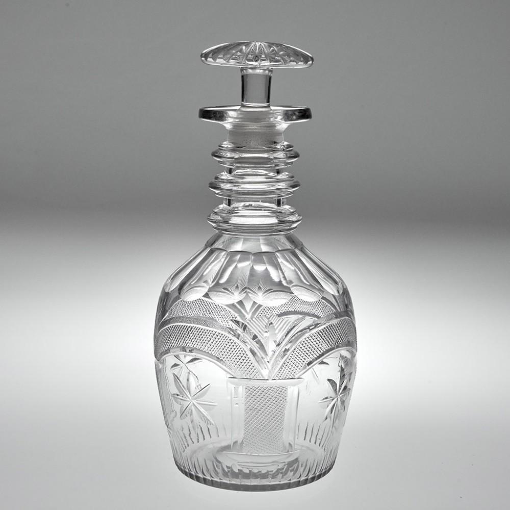 A Waterloo Glass Company Decanter Cork, c1825

Additional information: 
Period : George IV
Origin : Cork, Ireland
Colour : Clear
Stopper : Radial cut mushroom
Neck : Three triple annulated applied neck rings
Body :Prussian shape. Slice cut shoulder.