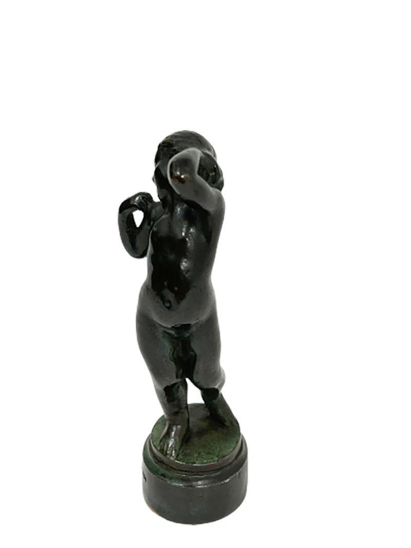 A wax seal stamp of a girl in bronze by Otto Valdemar Strandman

A wax seal stamp by Otto Valdemar Strandman Swedish sculptor (1871-1960) of a girl in bronze, ca 1910 with initials under the stamp of WD/DW. Marked with a Foundry mark and by Otto