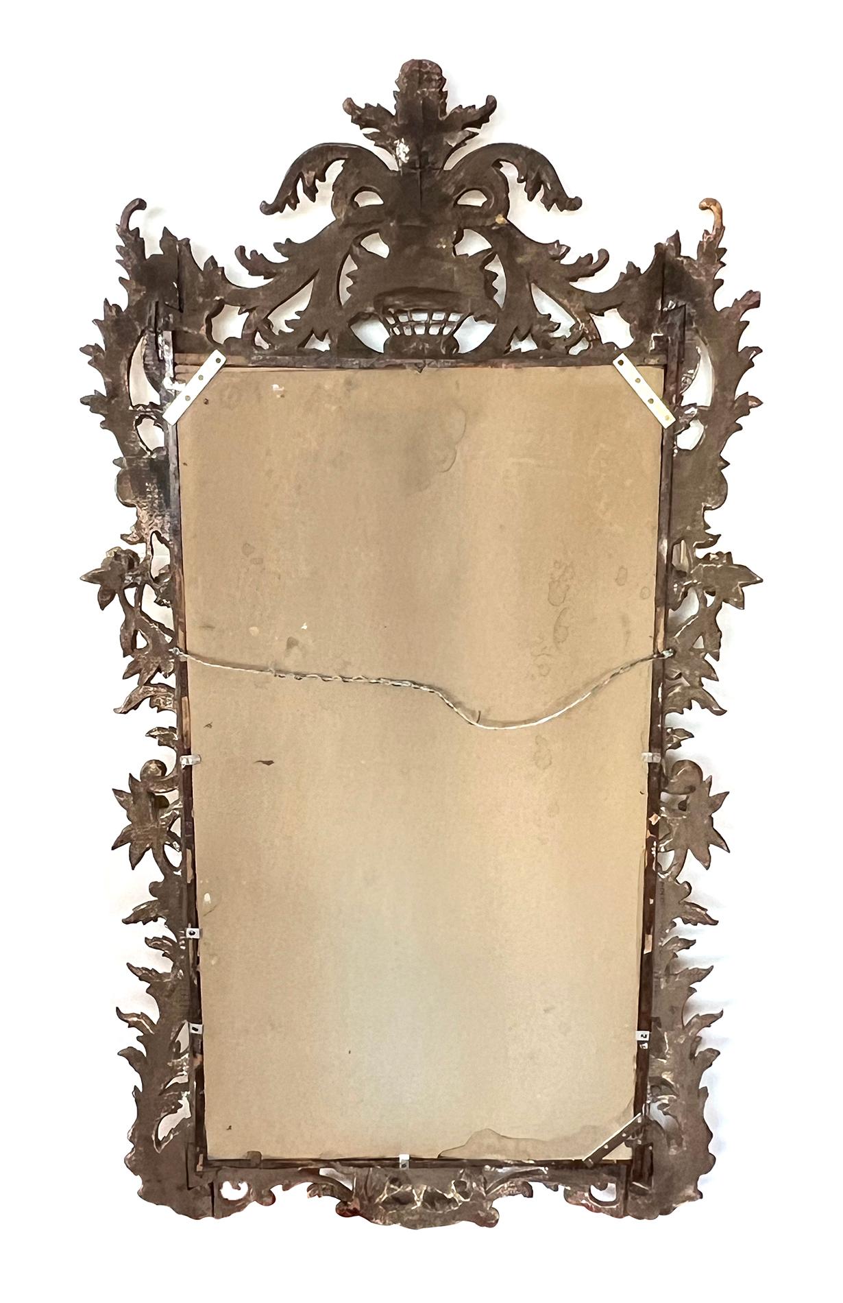 19th Century A Well-Carved French Rococo Style Giltwood Wall Mirror with Exuberant Crest For Sale
