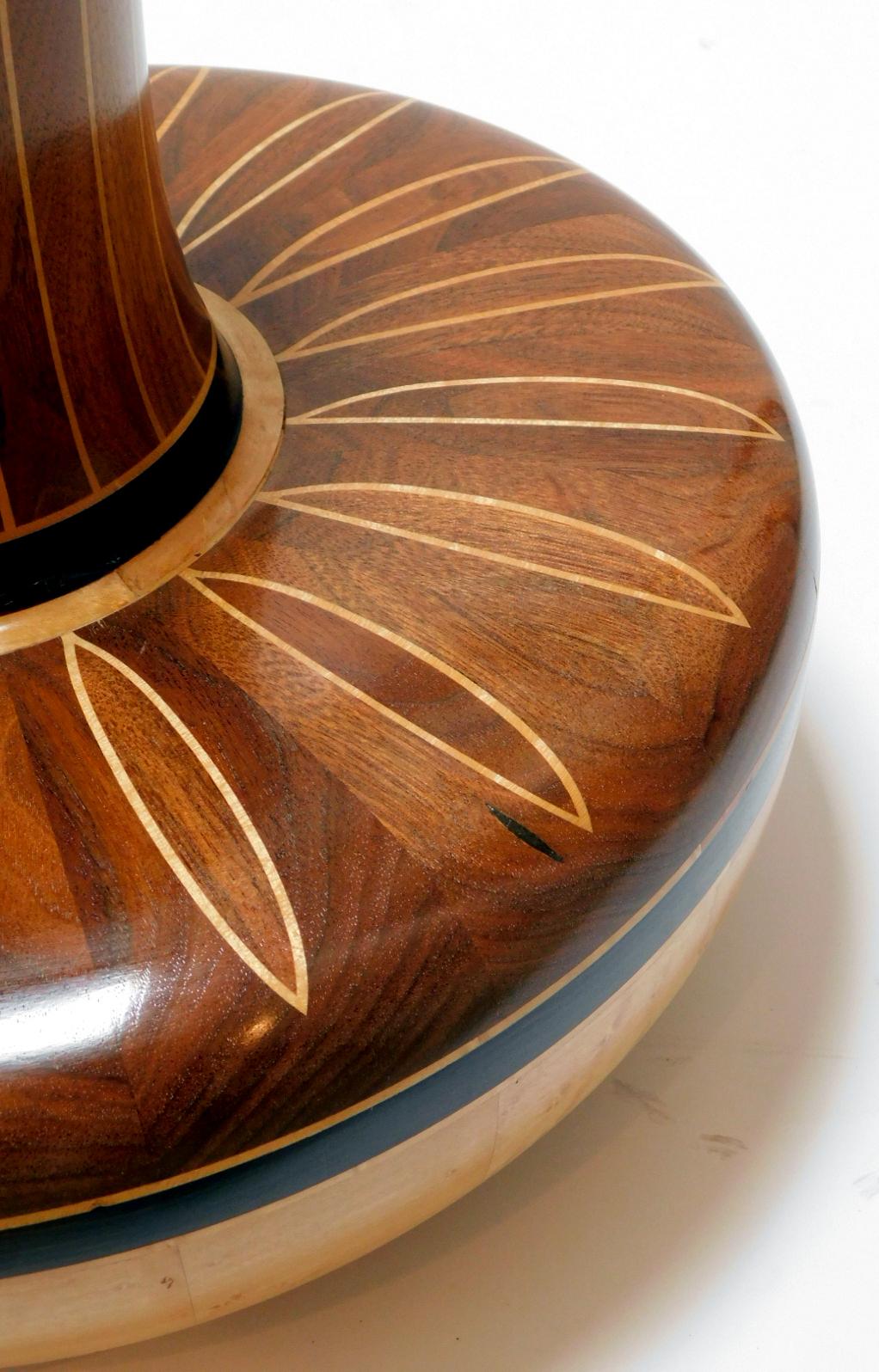 This handsome one-of-a-kind hand-crafted vase of beautifully figured walnut and birdseye maple.