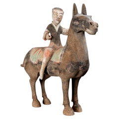 A Western Han Large Painted Pottery Equestrian Figure